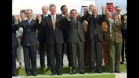 Israeli Prime Minister Shimon Peres, President Bill Clinton, Egyptian President Hosni Mubarak, Russian President Boris Yeltsin and PLO Leader Yasser Arafat, from left, pose at their one-day Summit of Peacemakers in Sharm El Sheikh, Egypt, on March 13, 1996. 