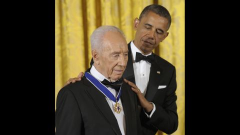 President Barack Obama awards Israeli President Shimon Peres the Presidential Medal of Freedom, the nation's highest civilian honor, at the White House on June 13, 2012. 