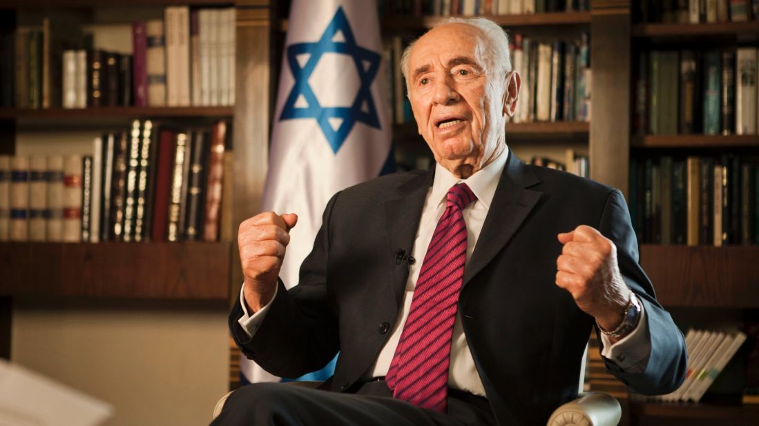 Israeli President Shimon Peres speaks during an interview with the Associated Press at his residence in Jerusalem on July 15, 2014. 