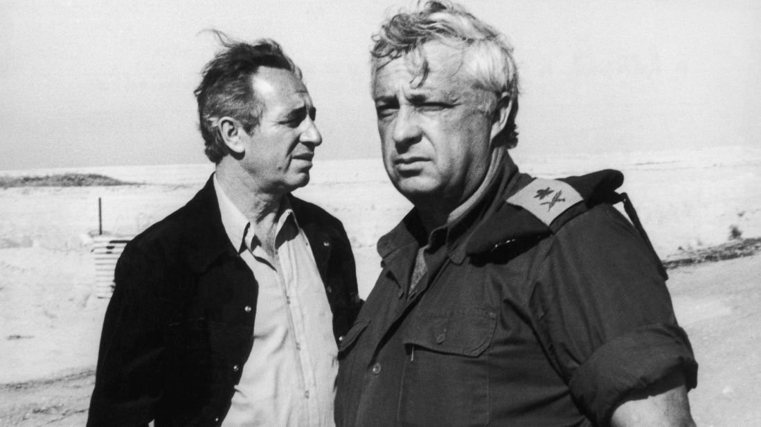 Peres, left, with then-Israel Defense Minister Ariel Sharon on January 2, 1974 in Ras Sudar in Egypt's Sinai Desert. The two were visiting one of the sites of the 1973 Yom Kippur War between Israel and a coalition of Arab states.