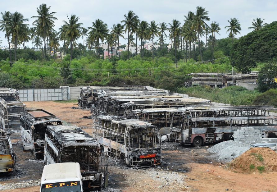 The skeletal remains of several buses that were set on fire, September 13, by an angry mob during clashes resulting from the Cauvery water dispute.