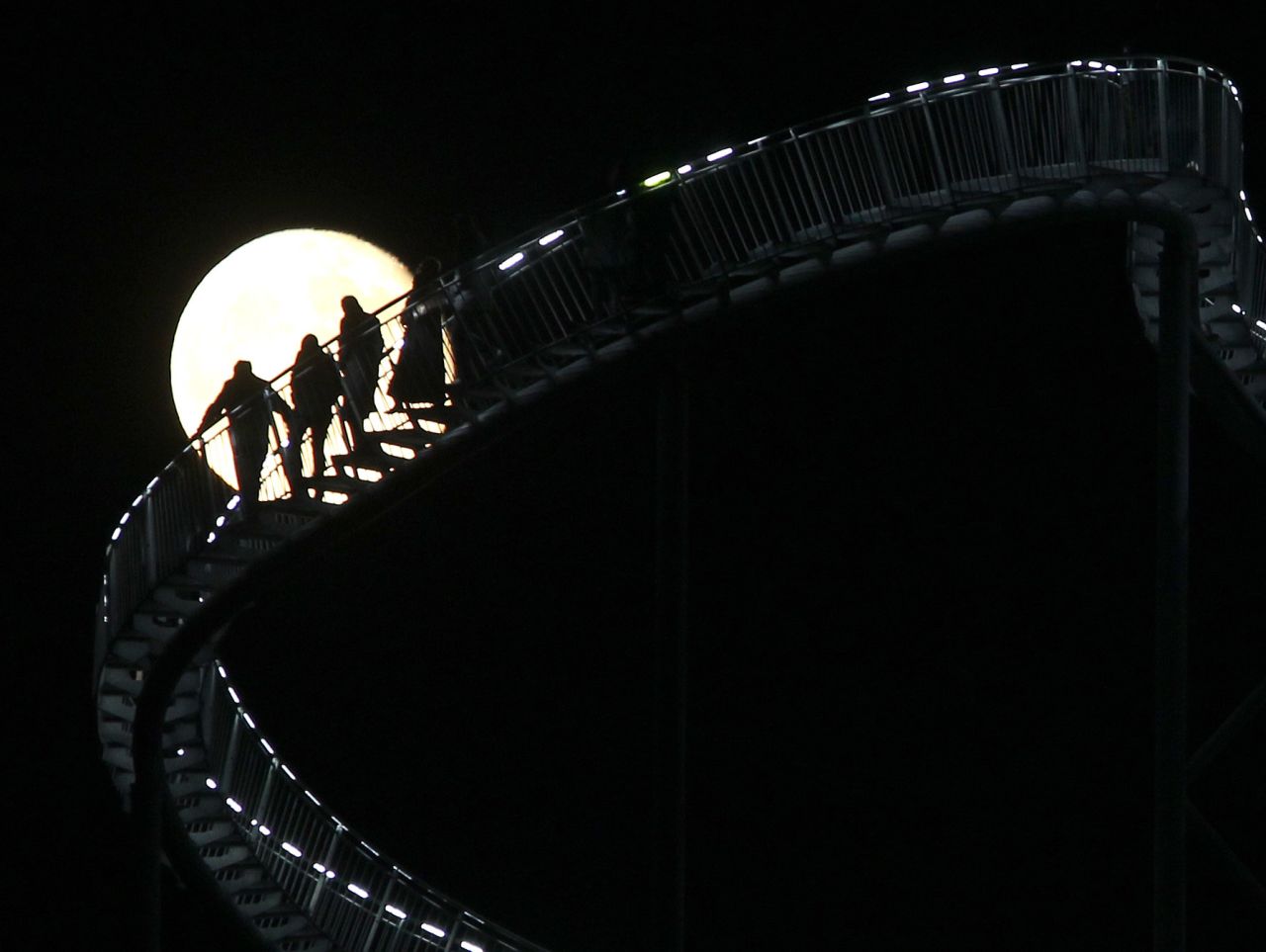 The staircase stands 18 meters (59 feet) tall and leads people on a roller coaster-like journey. 