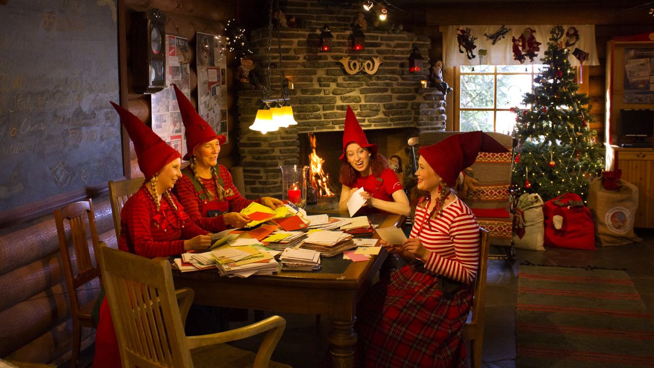 In addition to selling special stamps and souvenirs, they -- and potentially you -- wear elf clothes and Christmas hats and sort letters for Santa next to a cozy fireplace.