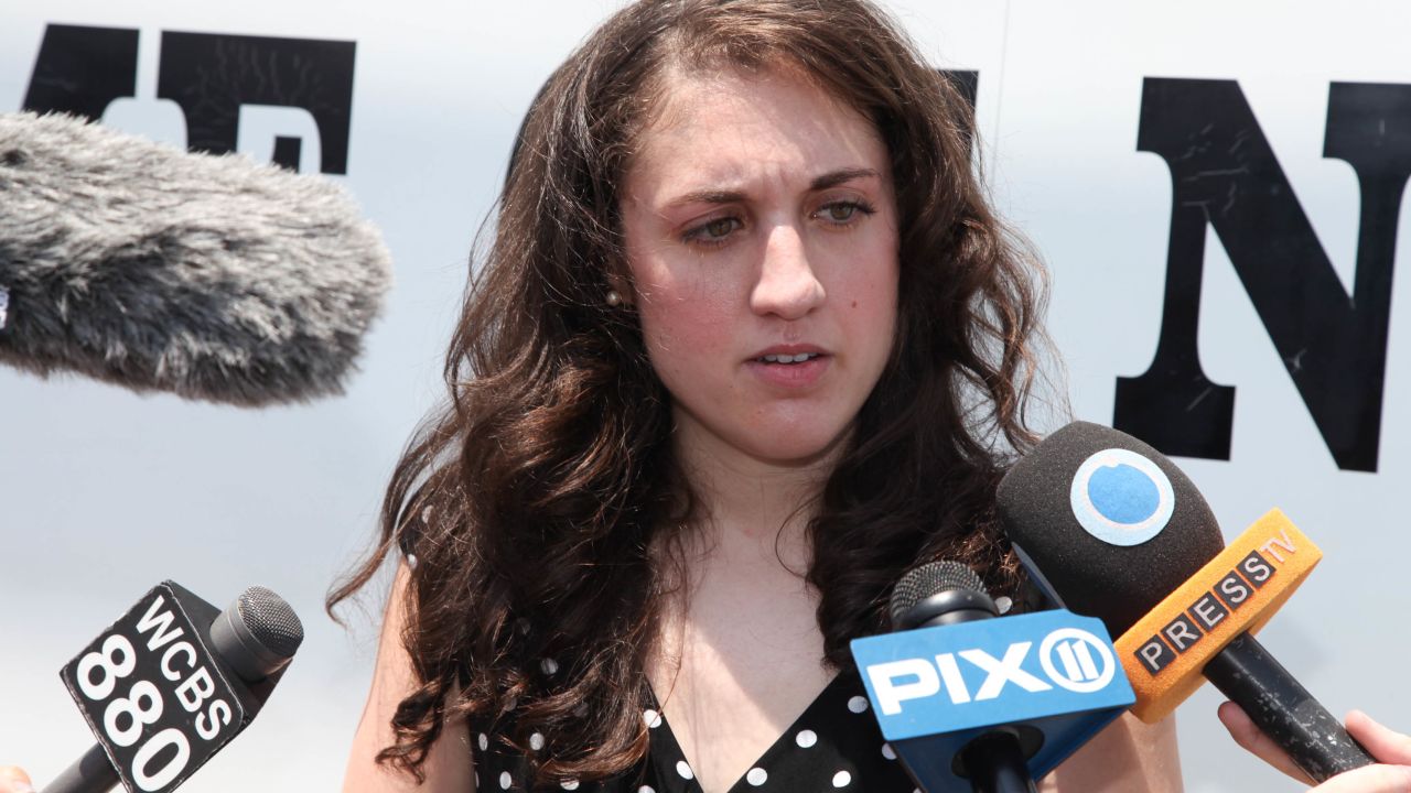 Activist Cecily McMillan speaks with reporters after her release from the Rikers Island jail in July 2014.