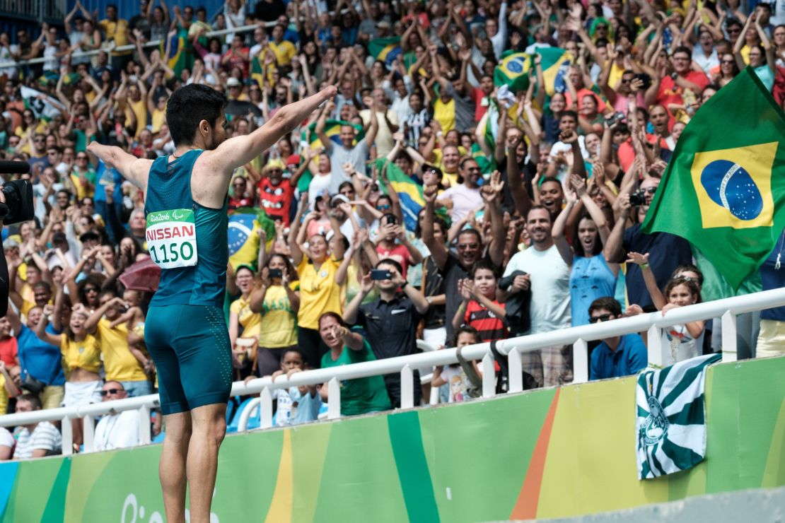 Brazil's Yohansson Nascimento takes the plaudits of the crowd after the 100m final.
