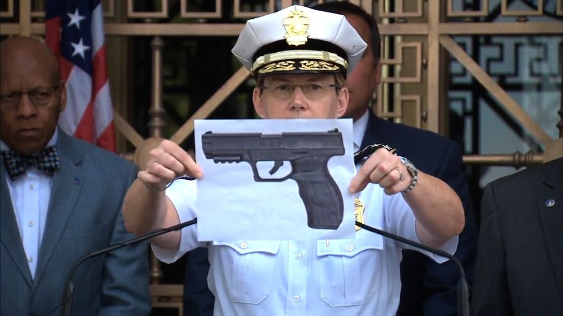 Columbus police Chief Kim Jacobs holds up a picture of what she says is a BB gun like Tyre King's.