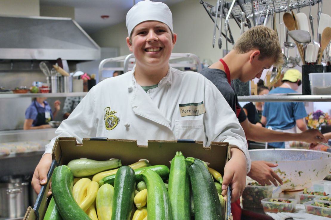 Ceres volunteers like Harrison, 16, work in the kitchen and garden with organic ingredients