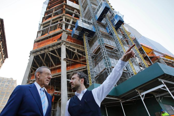 Stephen Ross, (left) Chairman of Related Companies, talks with Thomas Heatherwick, the designer of the "Vessel" sculpture, at Hudson Yards, Wednesday, Sept. 14, 2016 in New York.