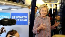 Hillary Clinton speaks to members of the traveling press aboard her campaign plane at Westchester County Airport on September 15, 2016 in White Plains, New York.
