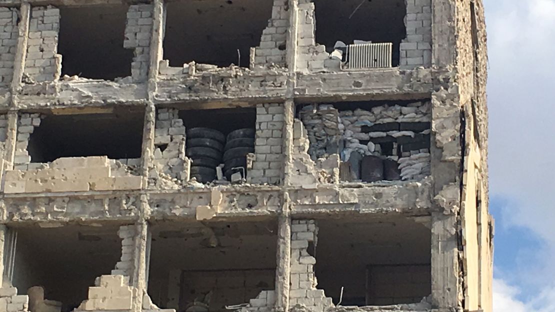 Tires and sand bags were used to fortify the firing positions in this building.