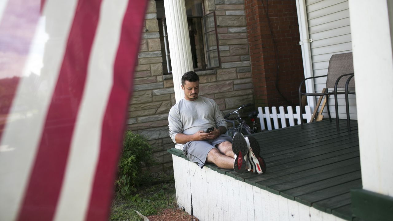 John Witlatch sits on the porch of a Lifehouse home. He is in the second month of recovery. 
