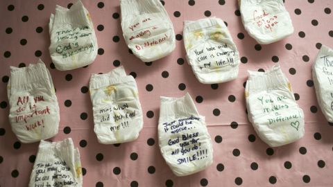 Diapers with parents' notes hang on the wall at Lily's Place, which cares for newborns suffering from withdrawal.