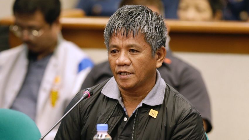 Former Filipino militiaman Edgar Matobato answers questions as he testifies before the Philippine Senate in Pasay, south of Manila, Philippines on Thursday Sept. 15, 2016. Matobato said that Philippine President Rodrigo Duterte, when he was still a city mayor, ordered him and other members of a squad to kill criminals and opponents in gangland-style assaults that left about 1,000 dead. (AP Photo/Aaron Favila)