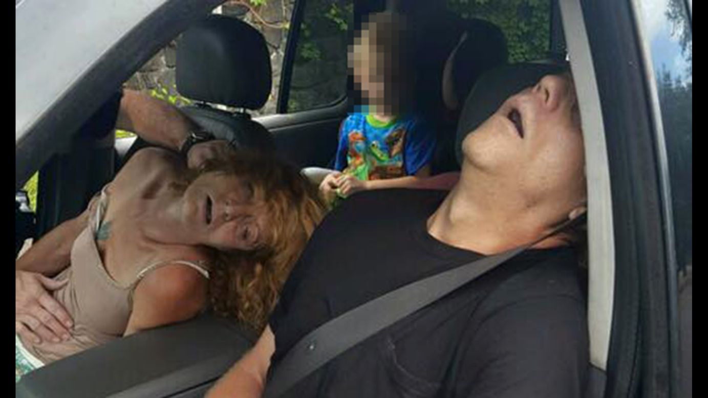 A woman and man in East Liverpool, Ohio, are seen passed out from a drug overdose as a child sits in the back seat of a car on Wednesday, September 7. The East Liverpool city administration <a href="https://www.facebook.com/cityofeastliverpool/posts/879927698809767" target="_blank" target="_blank">posted the photo on Facebook</a>, along with one other image, in order to show the <a href="http://www.cnn.com/2016/09/09/health/heroin-effects-police-photo-trnd/" target="_blank">devastating effects of heroin addiction</a>. Rhonda Pasek, the child's grandmother who is seen in the photo, has been <a href="http://www.cnn.com/2016/09/15/health/heroin-photo-woman-court/index.html" target="_blank">sentenced to 180 days in jail</a> and ordered to pay $280 in fines after pleading no contest to endangering a child and disorderly conduct and public intoxication.. <em>Editor's note: A portion of this photo has been blurred by CNN because of the age of the subject.</em>