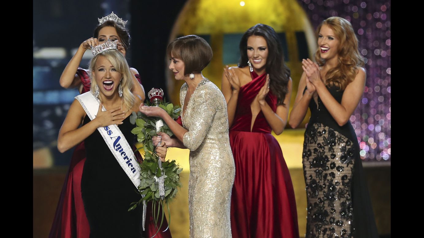The outgoing Miss America, Betty Cantrell, crowns this year's winner Savvy Shields of Arkansas at the Miss America pageant in Atlantic City, New Jersey, on Sunday, September 11.