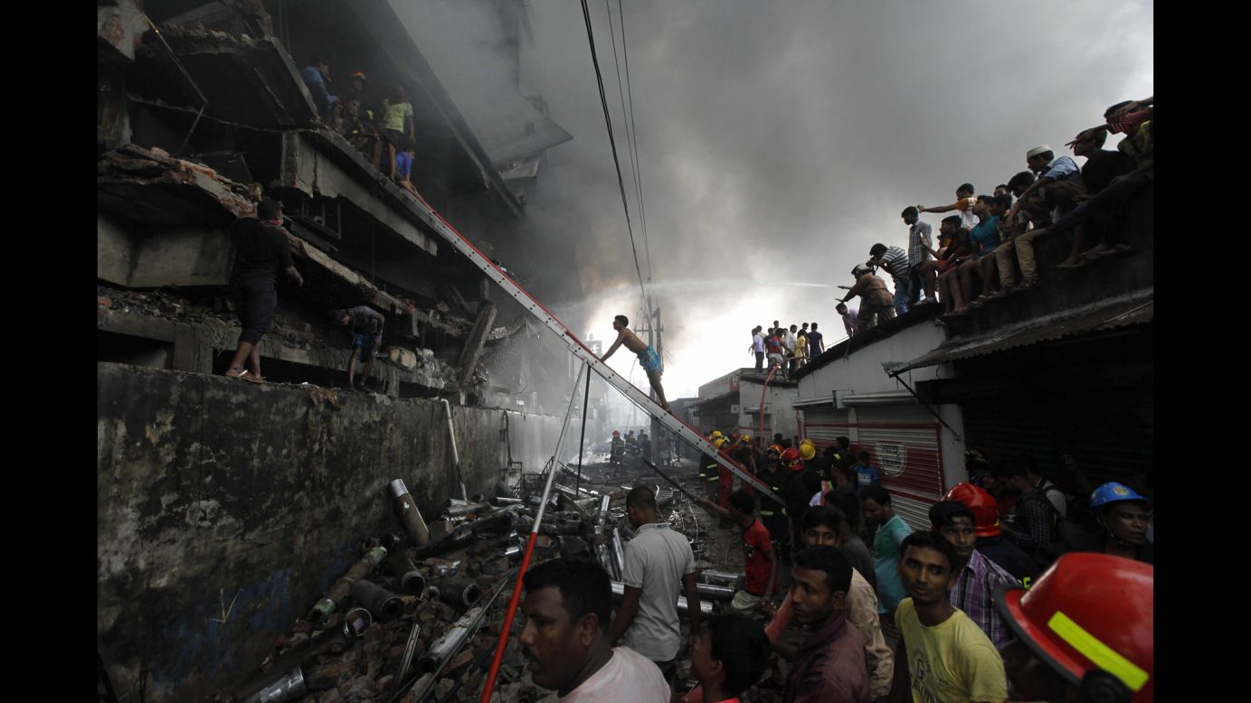 Firefighters attempt to extinguish a fire at a garment packaging factory in Tongi, Bangladesh, on Saturday, September 10. At least 23 people were killed after an explosion in the boiler room of the factory, <a href="http://www.bbc.com/news/world-asia-37327033" target="_blank" target="_blank">according to the BBC</a>.