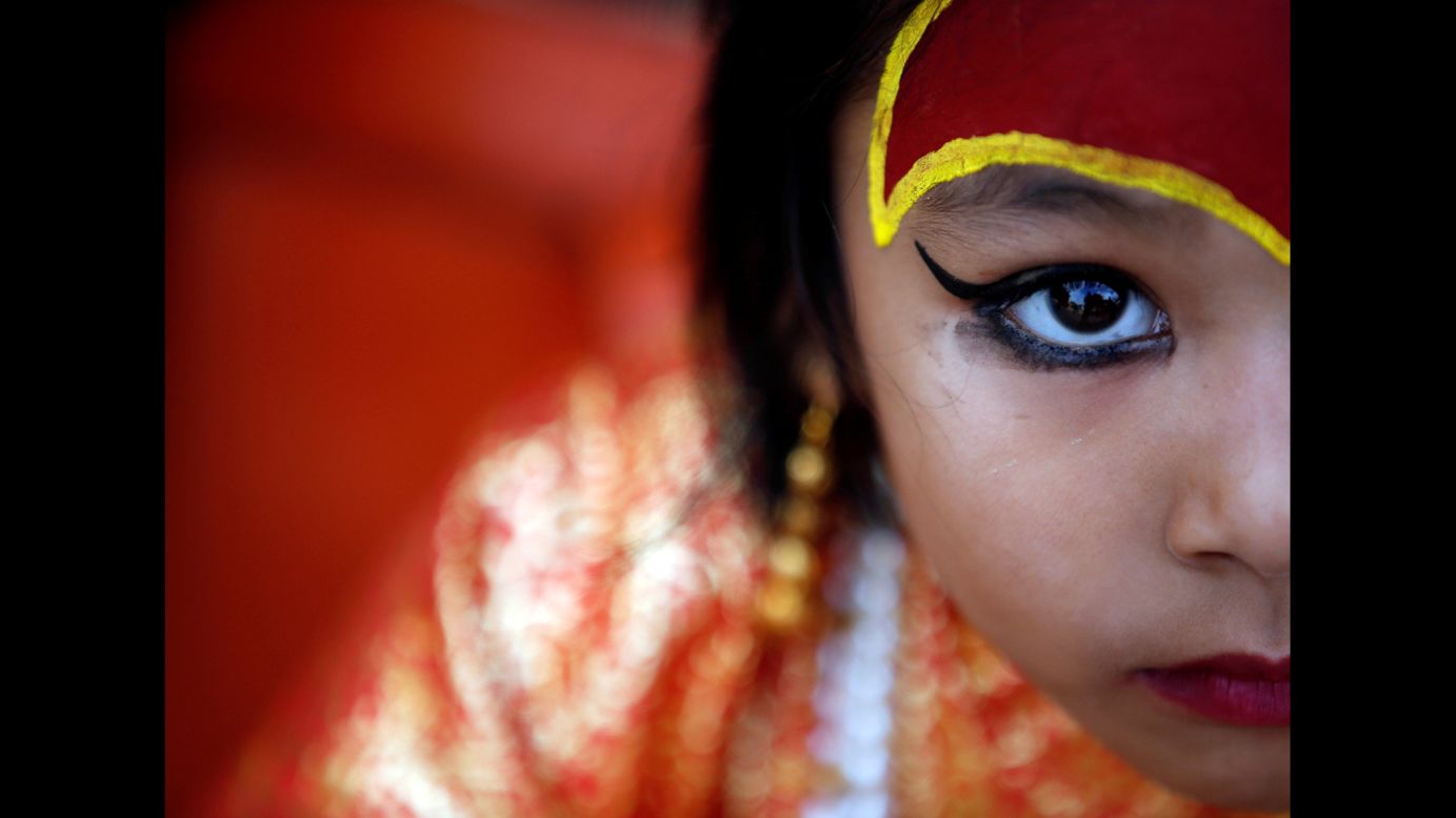 A child dressed as the goddess Kumari takes part in the Kumari Puja festival in Kathmandu, Nepal, on Wednesday, September 14. Kumari means "virgin" and is a Hindu tradition where young pre-pubescent girls are worshipped.