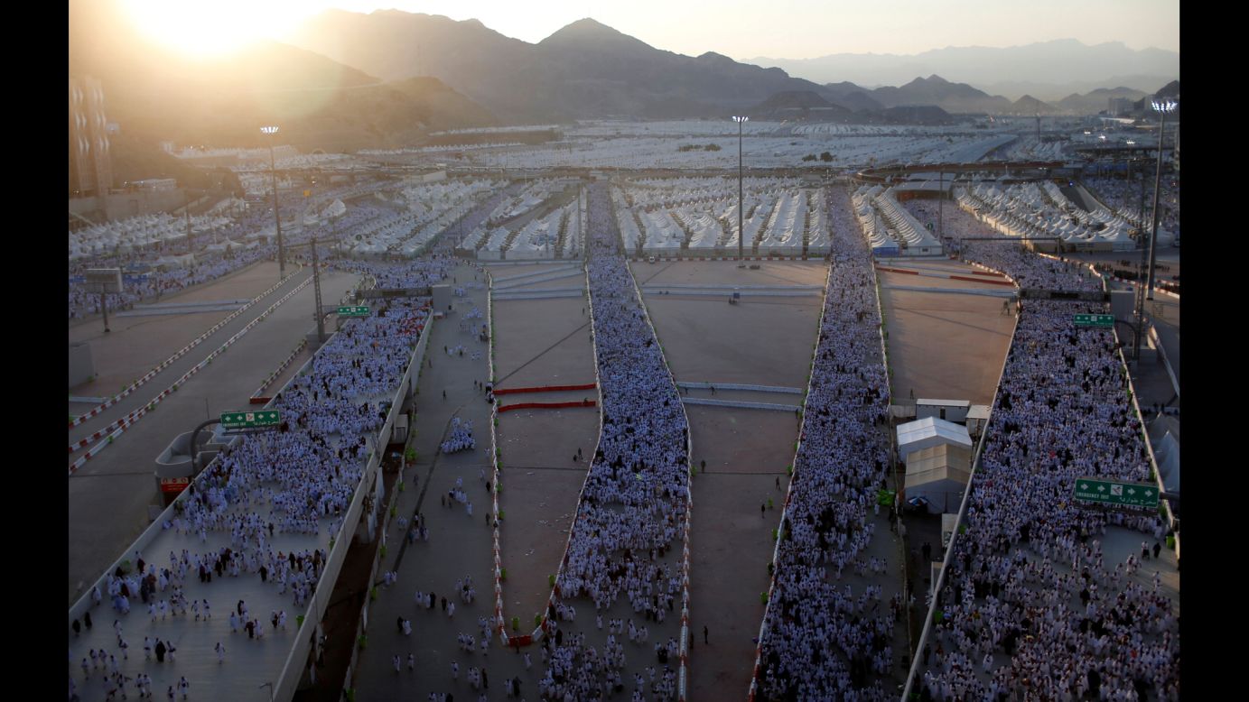 Muslims make their way to the "stoning of the devil" during the holy <a href="http://www.cnn.com/2016/09/09/middleeast/hajj-2016-saudi-arabia/" target="_blank">Hajj pilgrimage</a> on the first day of Eid al-Adha near Mecca, Saudi Arabia, on Monday, September 12. The "stoning of the devil" is a key ritual where pilgrims throw stones at three pillars known as the "Jamarat," symbolizing the rejection of the devil's temptation.