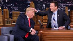 Republican presidential nominee Donald Trump plays along as Jimmy Fallon messes up his hair (after asking of course) when Trump made an appearance on The Tonight Show Starring Jimmy Fallon on Thursday, September 15, 2016.
