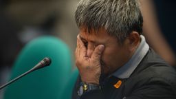 Former death squad member Edgar Matobato gestures as he testifies during a senate hearing in Manila on September 15, 2016. 
Rodrigo Duterte shot dead a justice department employee and ordered the murder of opponents, a former death squad member told parliament September 15, in explosive allegations against the Philippine president. / AFP / NOEL CELIS        (Photo credit should read NOEL CELIS/AFP/Getty Images)