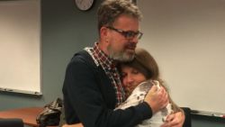 Canadian Kevin Garratt reunites with his wife Julia after being released from detention in China where he was charged with spying.