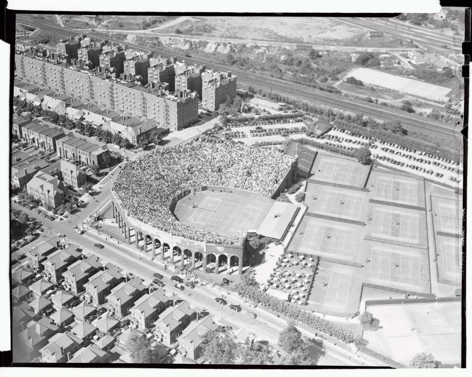An aerial shot of the West Side Tennis Club in suburban New York, circa 1937. The venue was famous for its horseshoe-shaped stadium and the stretch of grass courts leading to the clubhouse.