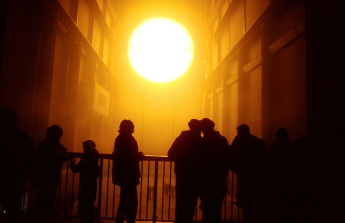 "The Weather Project" at Tate Modern art gallery, London, in 2003 used monofrequency lamps, projection screens, haze<br />machines, foil mirror, aluminium and scaffolding,