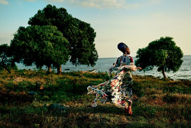 She took the fashion magazine's cameras around Western Kenya. Here she poses in a Chloe dress, Cara Croninger earrings, and Christian Louboutin sandals. The images were captured at Dunga beach near Lake Victoria. 