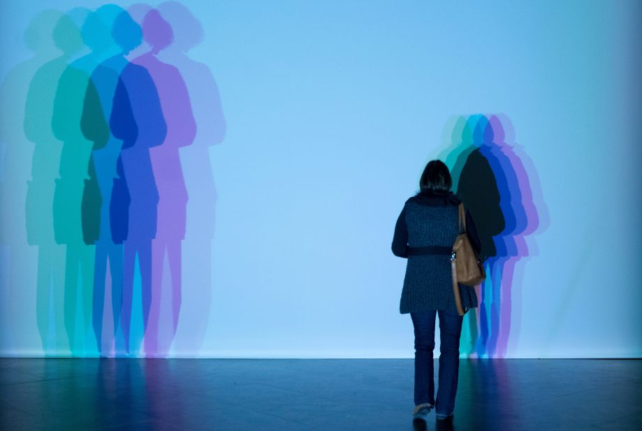 A visitor participates in the "Your uncertain shadow" installation at the Baroque,Baroque exhibition created by Danish-Icelandic-rooted artist Olafur Eliasson at Winter Palace of Prince Eugene in Vienna, Austria.