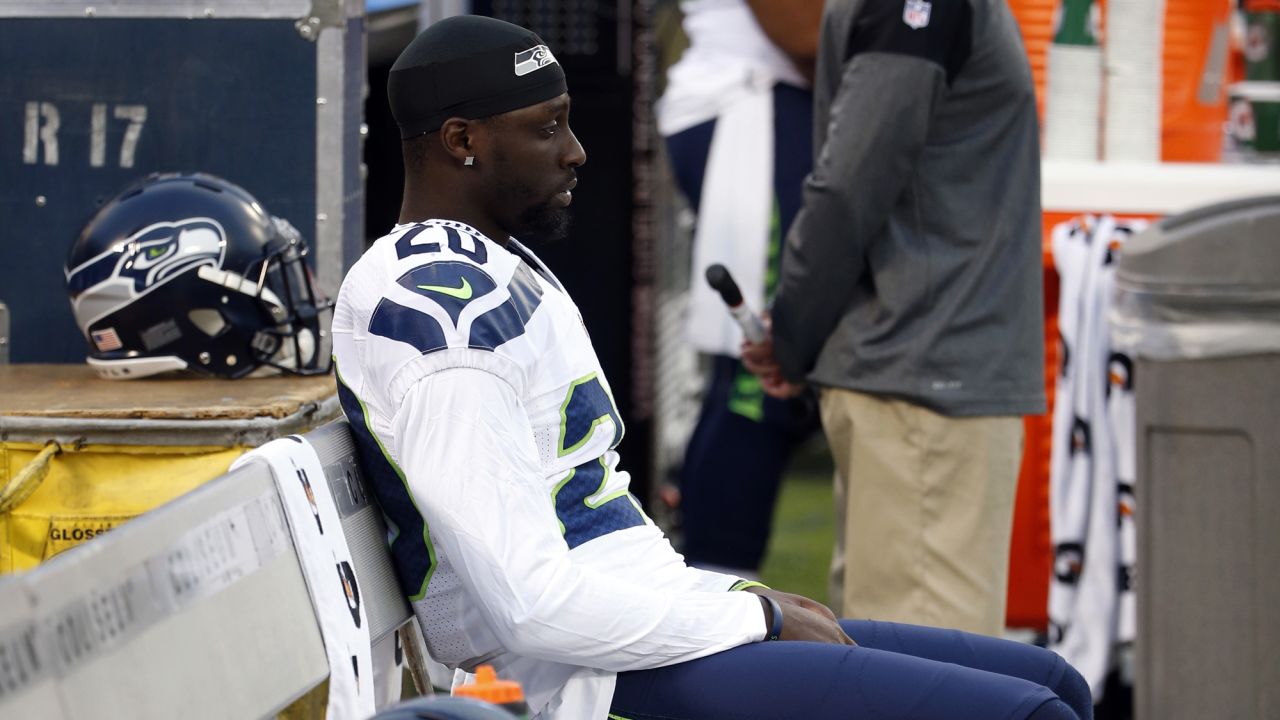 Seattle Seahawks' Jeremy Lane sits as the national anthem plays before a preseason match against the Oakland Raiders on September 1, 2016, in Oakland.