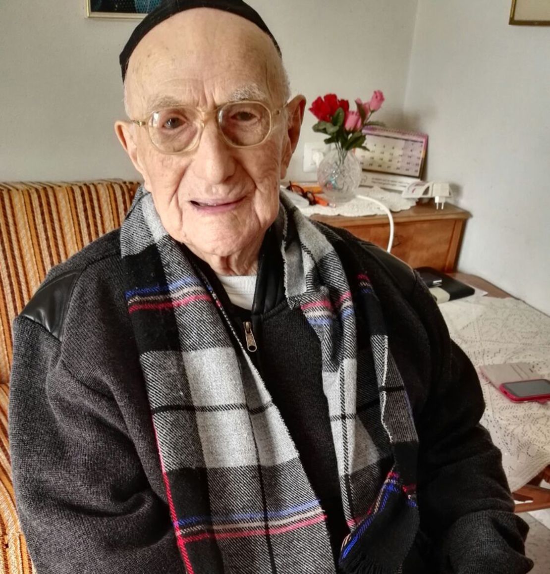 Yisrael Kristal sitting in his home in the Israeli city of Haifa in January.