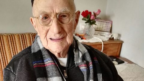 Yisrael Kristal sitting in his home in the Israeli city of Haifa in January.