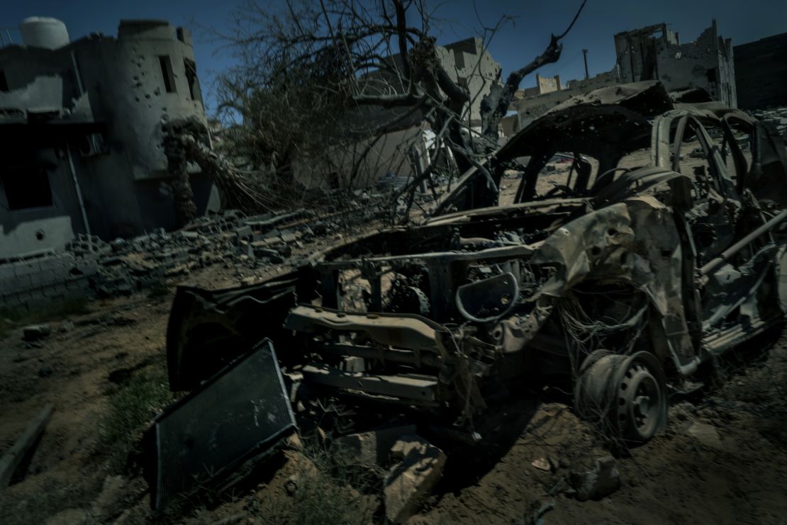 The remains of a former ISIS car after it was hit by a US airstrike, which began on August 1. 