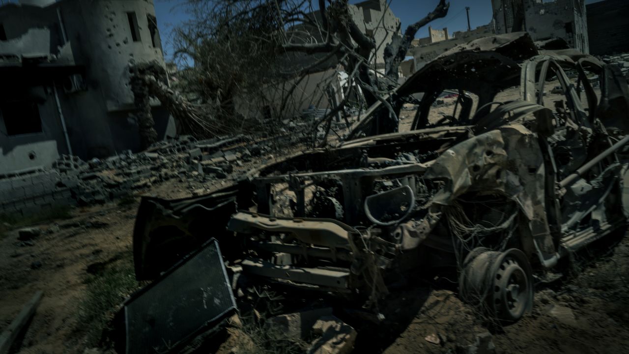 The remains of a former ISIS car after it was hit by a US airstrike, which began on August 1.