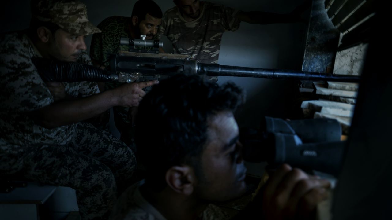 ISIS continue to lose ground in Libyan city of Sirte as UN-backed government militias, like the one pictured, reclaim districts in the city.