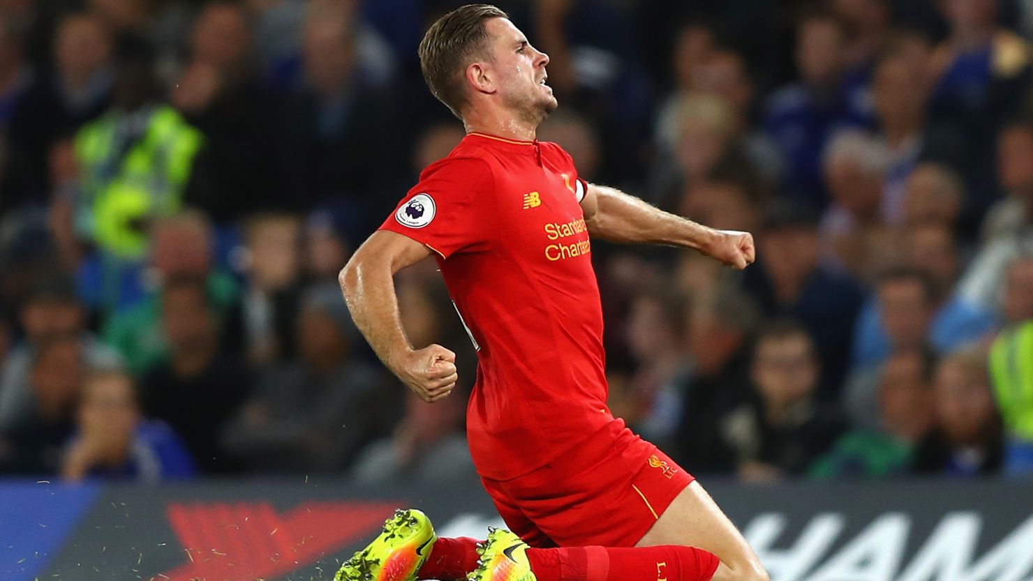 Jordan Henderson celebrates his goal in Liverpool's 2-1 victory over Chelsea.
