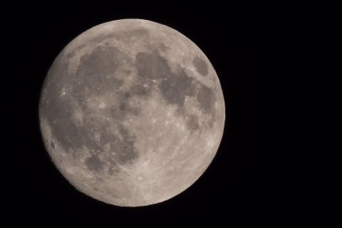 Eric Poirier always loves looking at the moon, he told CNN. Here's what he saw Thursday night, September 15, in Aylmer, Quebec. 