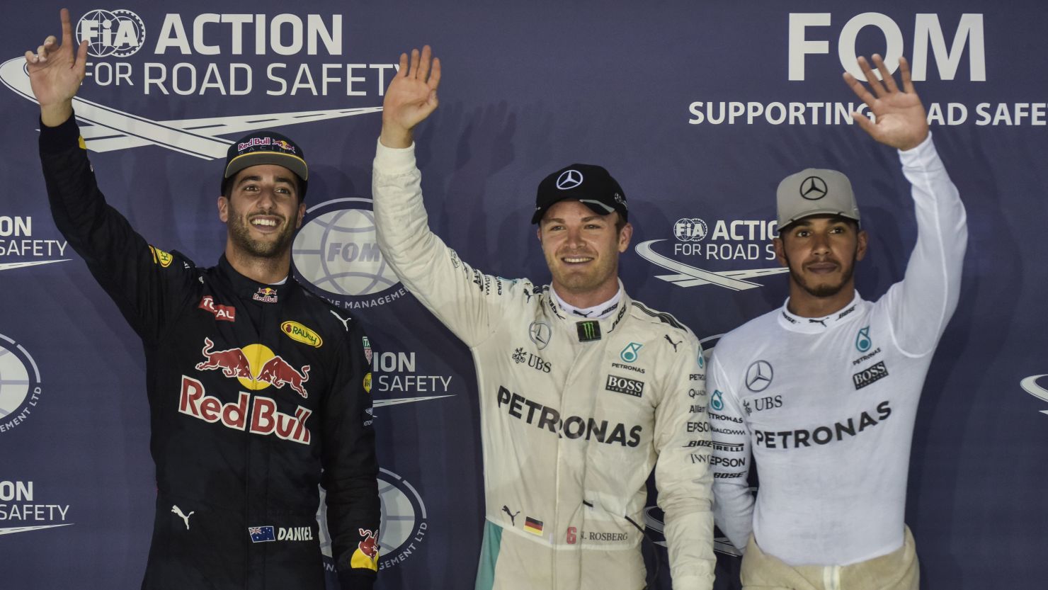Nico Rosberg, Daniel Ricciardo and Lewis Hamilton celebrate their top three finish in Singapore GP qualifying.