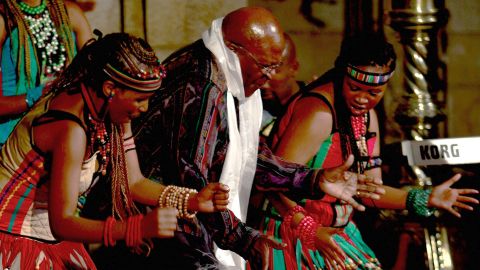 Tutu dances at the launch of his biography "Tutu: The Authorised Portrait" in 2011.
