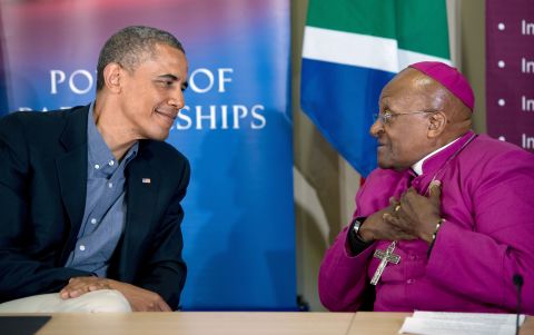 Obama speaks with Tutu in Cape Town following a tour of the Desmond Tutu HIV Foundation Youth Centre in 2013.