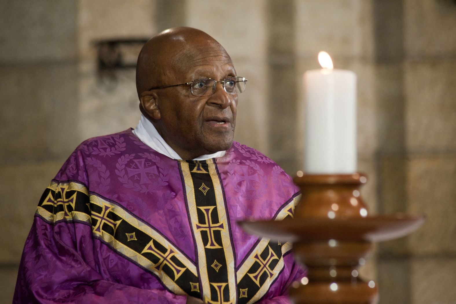 Tutu leads a service in Cape Town after Mandela's death in 2013.