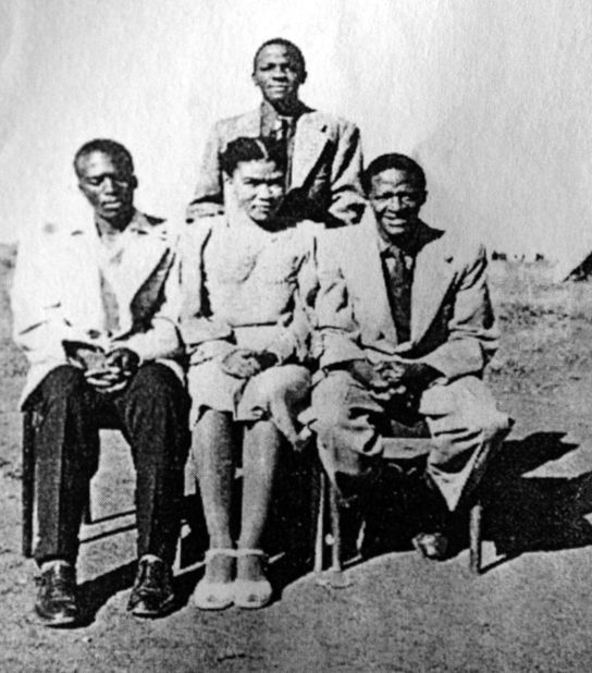 Tutu is seen at right with other members of the editorial staff of the Normalife, a publication produced by the students of the Pretoria Bantu Normal College in South Africa. Tutu graduated from the college with a teacher certificate in 1953.