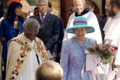 Tutu is seen with Britain's Queen Elizabeth II as she visited Cape Town in 1995.