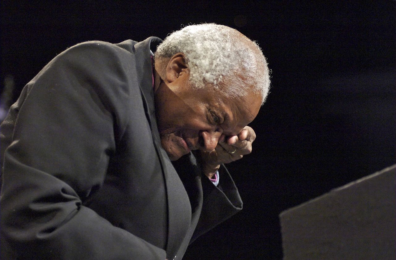 Tutu wipes away tears after hearing Peter Gabriel sing "Biko" in Johannesburg in 2007. The song is about the death of anti-apartheid activist Steve Biko.