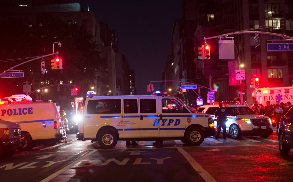 Police block off a road near the site of the explosion. 