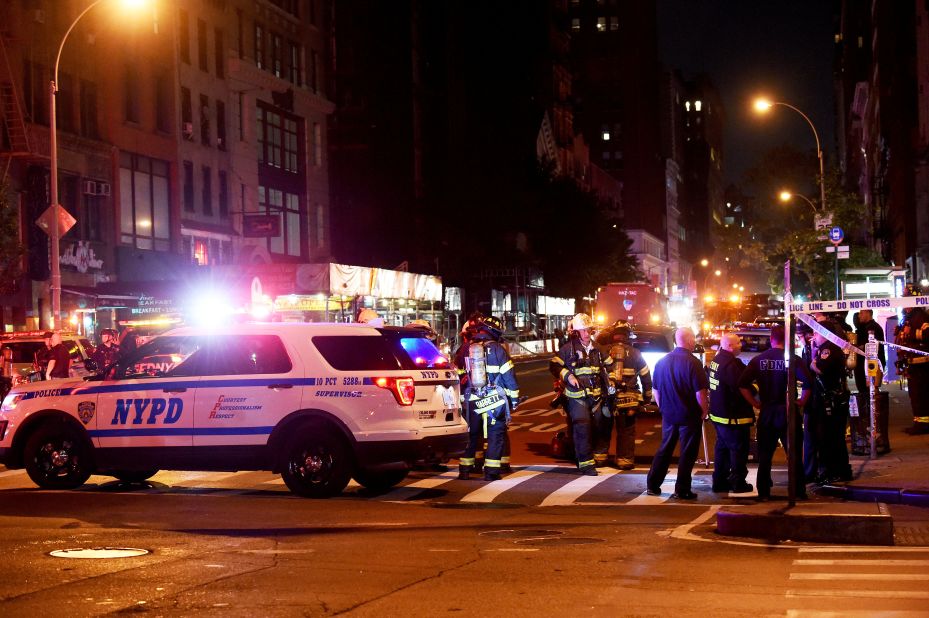 Police officers and firefighters respond to the scene. 