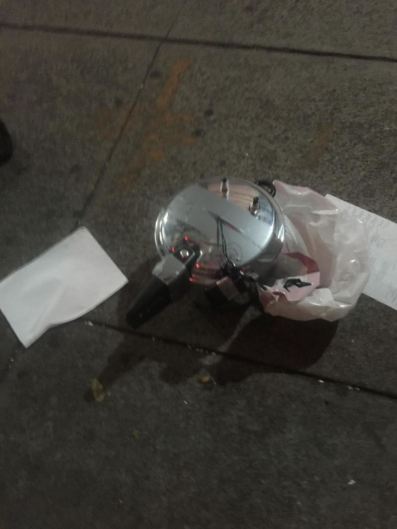 Just blocks away from the explosion, a suspicious device was found. Officials said the device appeared to be a pressure cooker with dark-colored wiring protruding, connected by silver duct tape to what appeared to be a cell phone.