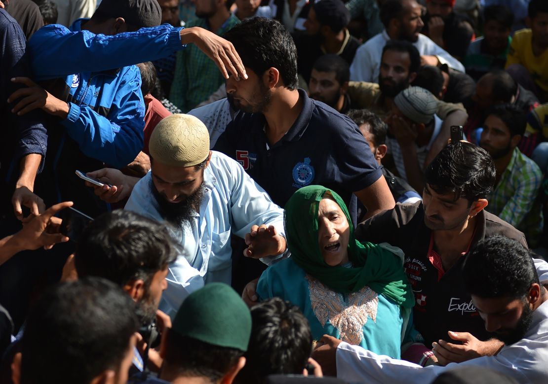 Mourners attend Nasir Shafi's funeral on Saturday.