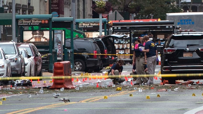 NEW YORK, NY - SEPTEMBER 18: FBI agents review the crime scene of remnants of bomb debris on 23rd St. in Manhattan's Chelsea neighborhood on September 18, 2016 in New York City. An explosion that injured 29 people that went off in a construction dumpster is being labeled an "intentional act". A second device, a pressure cooker, was found four blocks away that an early investigation found was likely also a bomb. (Photo by Stephanie Keith/Getty Images)