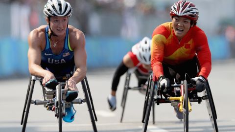 Tatyana McFadden of the USA is edged out at the finish by Lihong Zou of China.